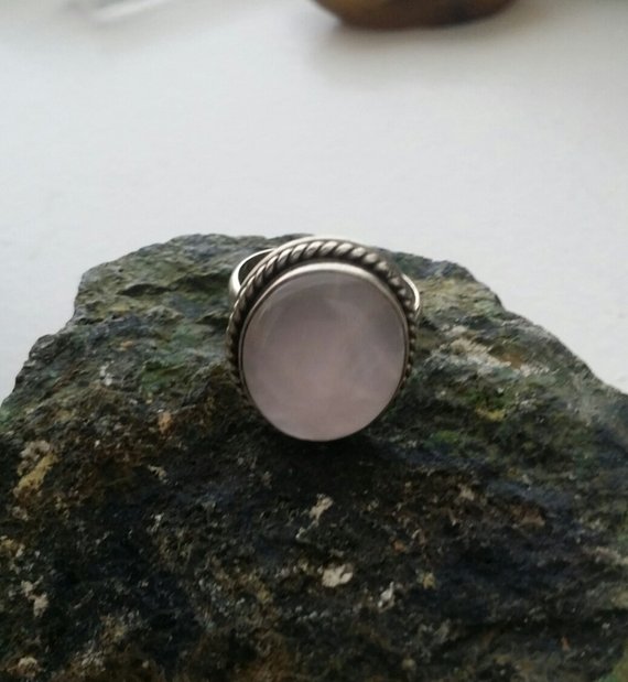 Rose Quartz oval cabochon in sterling setting with rope design