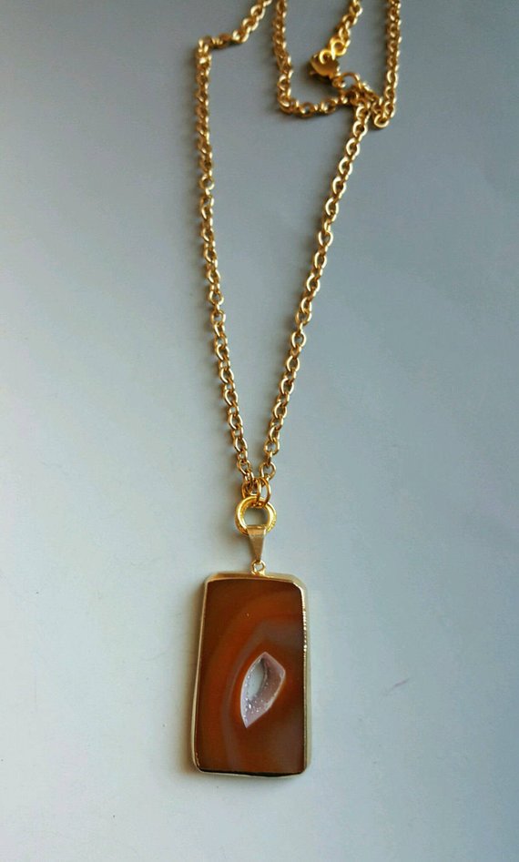 Beautiful brown-orange agate druzy with 24K electroplated edges, on brass chain and lobster clasp