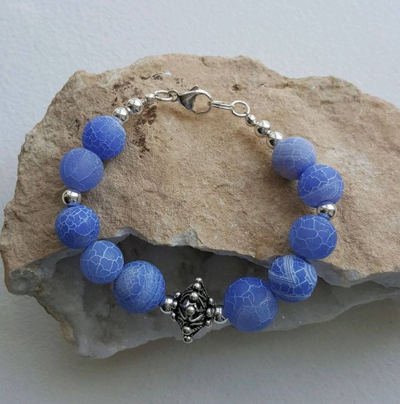 Beautiful blue matt fire agate beads, fab sterling center bead, sterling beads and lobster clasp Matching earrings available