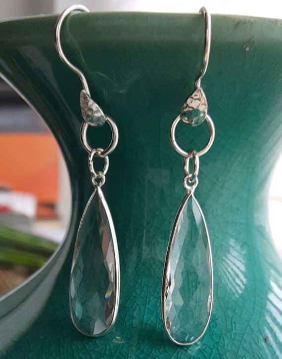 Beautiful faceted crystal quartz teardrop in sterling frame on sterling hammered ear wires