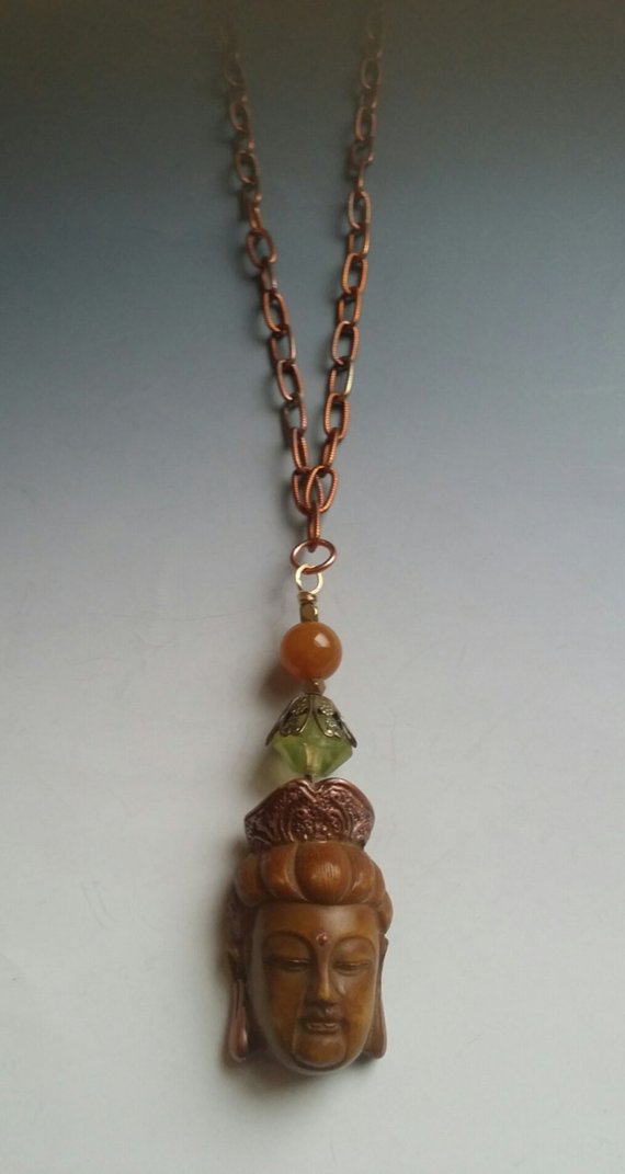 Bone carved Buddha, glass and agate beads on color heated large copper chain