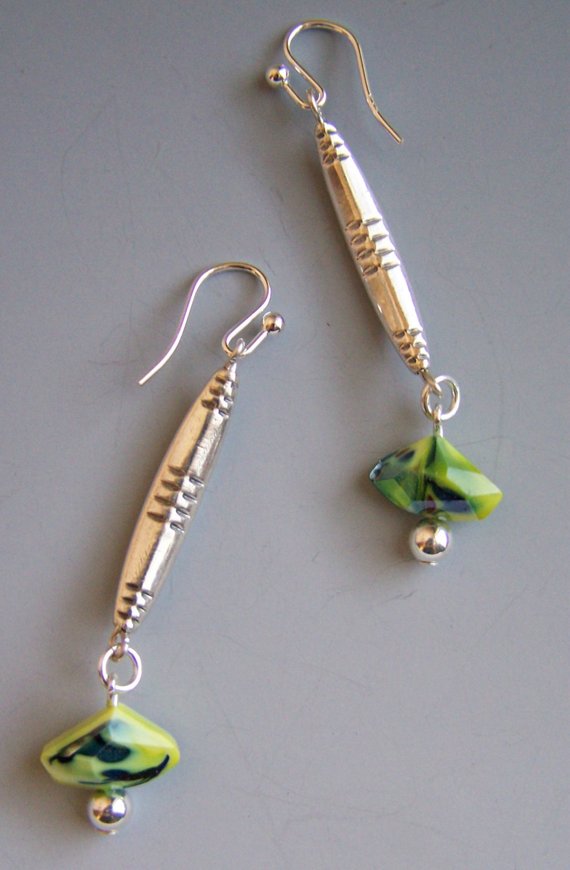 Hollow sterling long beads with green cut glass dangles. Sterling beads and wires