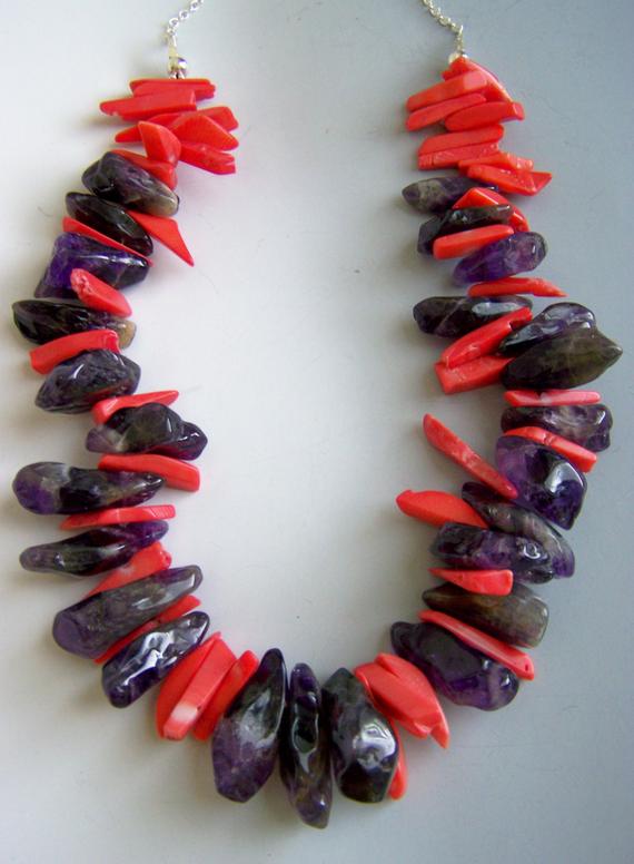 Large, irregular Amethyst stones with orange coral beads, sterling chain and lobster