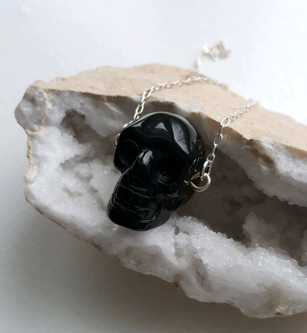 Carved black Onyx skull on sterling wire and chain